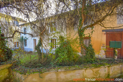 Solid set of buildings by the river