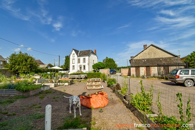 Stately village house with barn