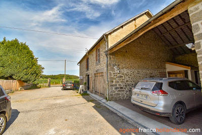 Stately village house with barn