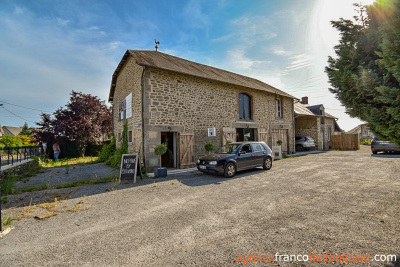 Stately village house with barn