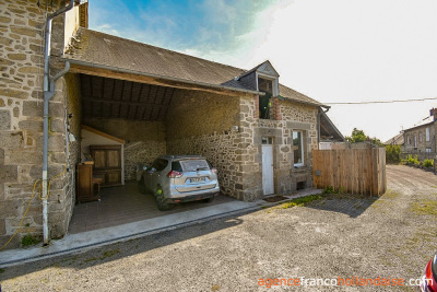 Stately village house with barn