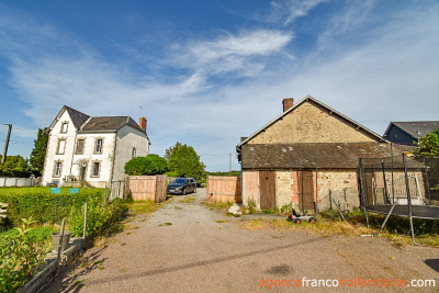 Stately village house with barn