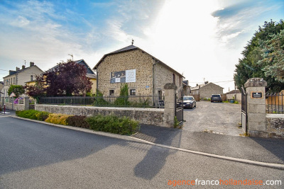 Stately village house with barn