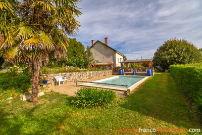 House with barns, swimming pool and close to 4 acres