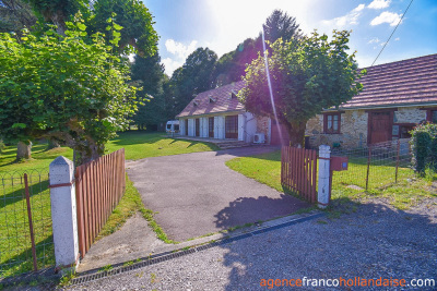 Bungalow with outbuildings and a mature park