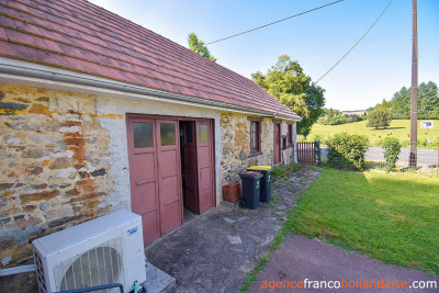 Bungalow with outbuildings and a mature park