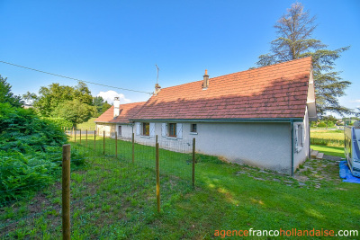 Bungalow with outbuildings and a mature park