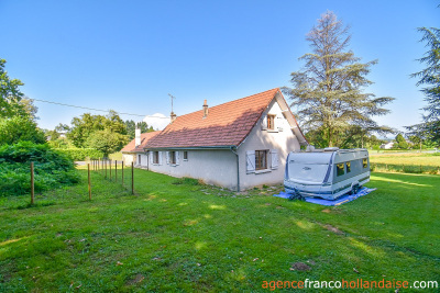 Bungalow with outbuildings and a mature park