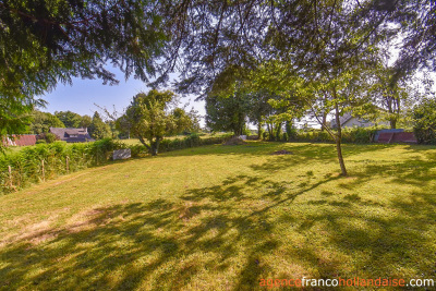 Bungalow with outbuildings and a mature park