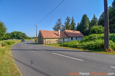 Bungalow with outbuildings and a mature park