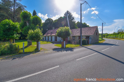 Bungalow with outbuildings and a mature park