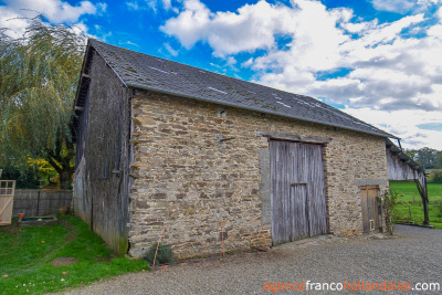 Land and outbuildings in the heart of the village