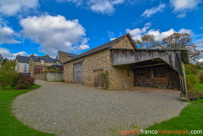 Land and outbuildings in the heart of the village