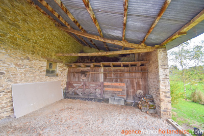 Land and outbuildings in the heart of the village