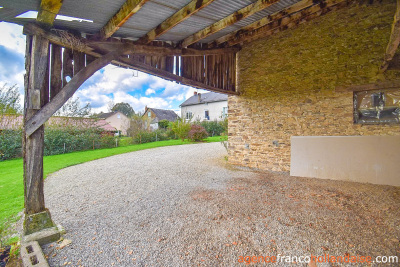 Land and outbuildings in the heart of the village