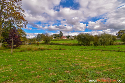 Land and outbuildings in the heart of the village