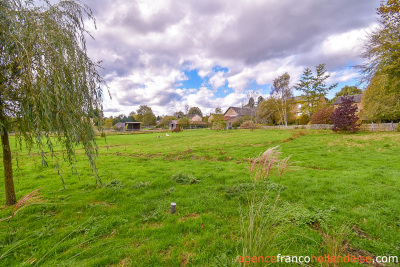 Land and outbuildings in the heart of the village